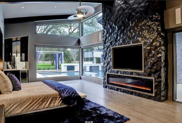 Master bedroom with electric fireplace